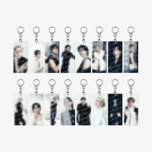Twelve rectangular acrylic keychains with silver key rings, arranged in two rows of six on a light gray background. Each keychain features a blurred portrait photo of a male idol with repeated 'STAYCUT' watermark text.