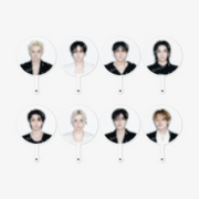 Eight round acrylic fan paddles featuring different portrait photos of a male idol, arranged in a 2x4 grid on a light gray background.