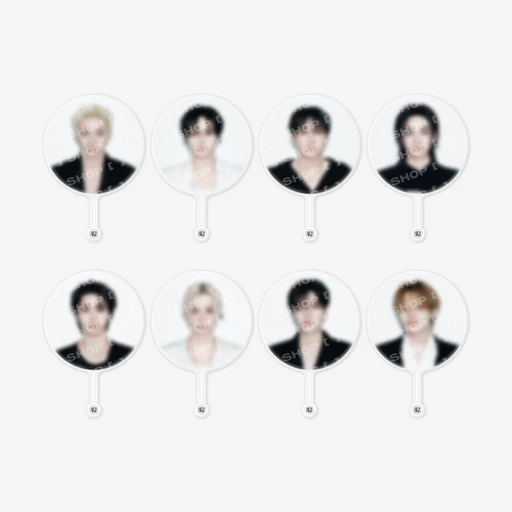 Eight round acrylic fan paddles featuring different portrait photos of a male idol, arranged in a 2x4 grid on a light gray background.