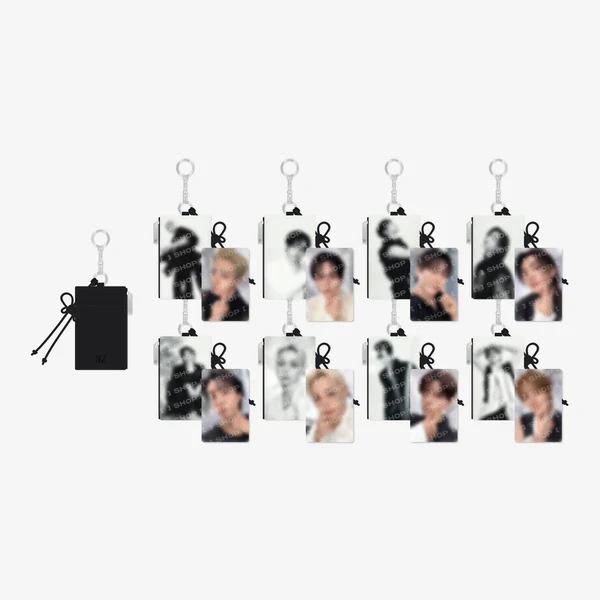 A set of small rectangular photo keychains with metal key rings, shown on a plain light gray background. One black pouch with a drawstring is shown separately on the left, and the keychains feature monochrome and color portrait prints.